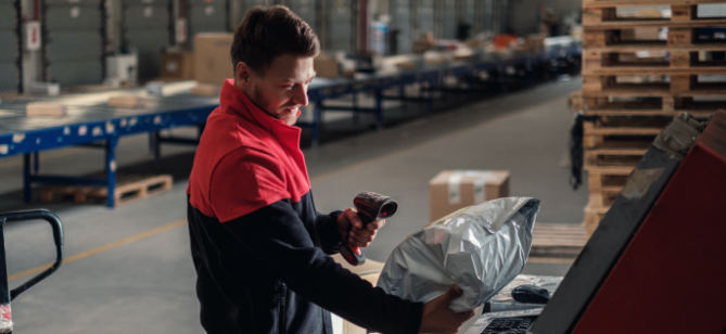 warehouse worker scanning item